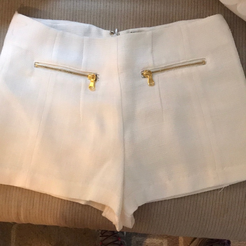 White shorts with gold zipper